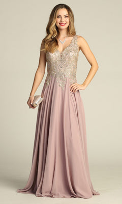 A woman wearing the Long Formal Dress: Chicas DM4006 in mocha, featuring a sleeveless design with an embroidered bodice and a flowing chiffon A-line skirt with silver embellishments, accessorized with a necklace, bracelet, and holding a small clutch.