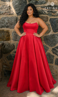 A plus-size person wearing a Faviana E11670E, a floor-length, strapless red mikado A-line gown with a full skirt.