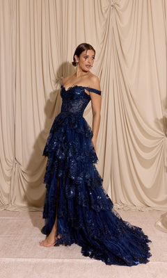 Off-Shoulder Long Ruffle Prom Dress: Eureka EK102 in navy blue, featuring an off-the-shoulder neckline, tiered ruffles, sequined floral detailing, and a high leg slit.