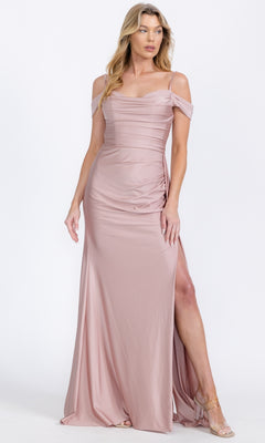 A woman models the Eureka EK117 off-shoulder long formal dress in light pink with a thigh-high slit, ideal for special occasions, standing against a plain white background.