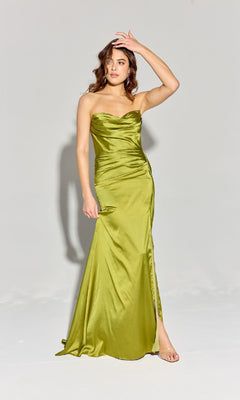 A woman stands against a plain background wearing the Strapless Long Satin Prom Dress: Eureka EK118 in lime green, featuring a fitted bodice and floor-length skirt.