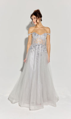 A woman wears the Off-Shoulder Long Prom Ball Gown: Eureka EK128, a light gray dress with a corset-style bodice and sheer floral details, standing against a plain white background.