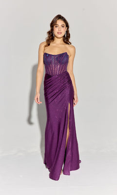 A woman poses against a plain light background in the Strapless Beaded Long Prom Dress: Eureka EK169, featuring a floor-length design with a sheer corset bodice, ruched skirt, thigh-high slit, and subtle sparkles.