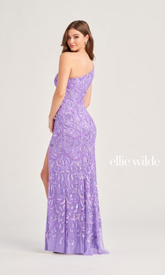 A woman models the Ellie Wilde One-Shoulder Beaded Prom Dress EW35021, featuring a light purple hue, sequin patterns, and a high slit. “ellie wilde” appears on the right against a plain background.