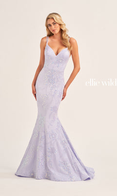 A woman wears the Ellie Wilde Long Mermaid Formal Dress EW35083, a fitted lavender mermaid gown with thin straps and subtle sequin details, standing against a plain light background.