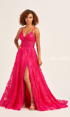 A woman wearing the A-Line Long Ellie Wilde Glitter Prom Dress EW35103 stands against a plain light background.