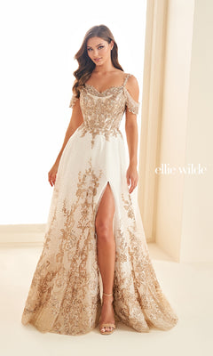 A woman poses in the Ellie Wilde EW36220, a cream and gold off-the-shoulder long prom dress with a high slit, featuring intricate embroidery and glitter tulle. "ellie wilde" is displayed beside her against a neutral background.