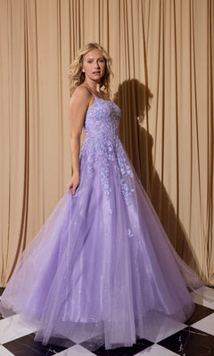 A woman stands on a black and white checkered floor wearing the Eureka EK197 long lilac prom dress with floral appliqués, in front of beige curtains.