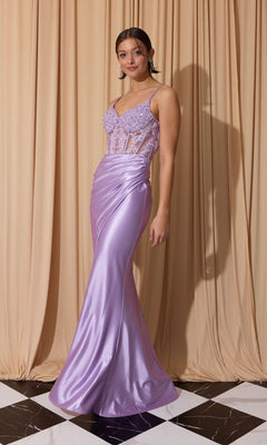 A woman stands on a black-and-white tiled floor in front of beige draped curtains, wearing the lilac Long Prom Dress: Eureka EK203 with a fitted silhouette, lace corset bodice, and spaghetti straps.