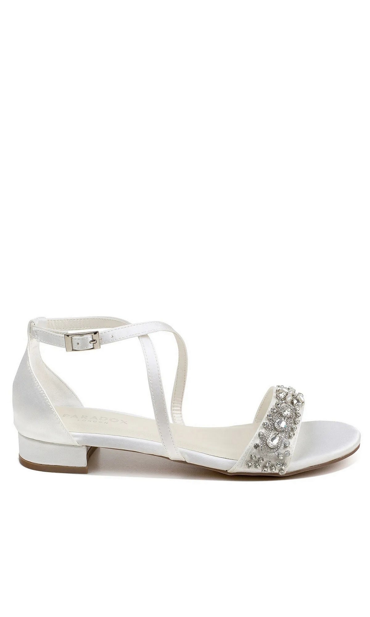 Elyse Ivory Prom Shoes: Paradox London P2231 in ivory satin, featuring a low block heel, an ankle strap, and a rhinestone-embellished toe band.