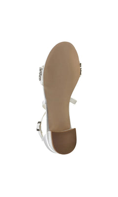 Elyse Ivory Prom Shoes: Paradox London P2231 ivory low-heeled sandal with a rhinestone-embellished strap, featuring a jeweled block heel viewed from the sole.