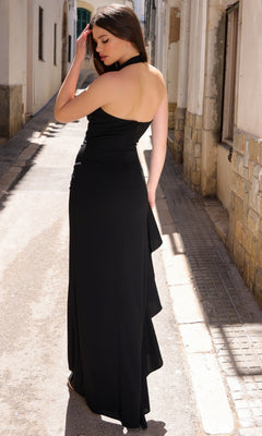 Turn heads in the Velvi Ruffled Long Halter Prom Dress Esme—shown here in a sunlit alleyway, this stunning evening gown offers a gorgeous formal look for under $100.