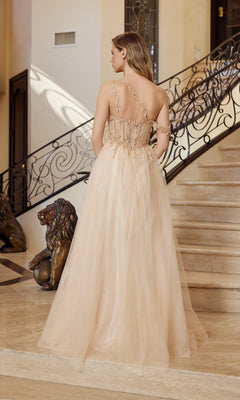 A woman wearing the Nox Anabel F1567 Asymmetrical Glitter Prom Dress stands on a marble floor beside a staircase with a decorative railing and a lion statue.