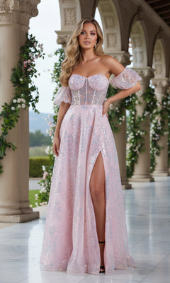 In a marble hall with arched columns and green vines, a woman wears the PromGirl Puff-Sleeve Blush Pink Unique Prom Dress, featuring a sheer corset bodice and high leg slit, completing her elegant look.