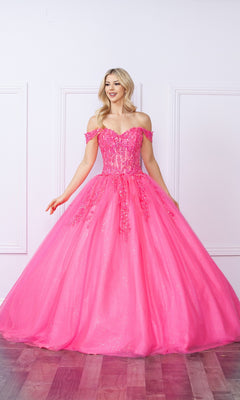 A woman stands indoors wearing the Bright Off-the-Shoulder Long Prom Ball Gown H1349, a vibrant pink dress with a full tulle skirt and sparkling sequins—an eye-catching choice for any formal event.