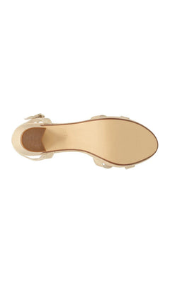 Bottom view of a gold glitter Harmon Champagne Prom Shoes: Touch Ups 4676 sandal featuring a low block heel and strappy design.