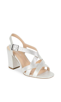 Hilde Silver Prom Shoes: Paradox London P2405 silver metallic block-heel sandals featuring crisscross straps and an adjustable buckle ankle strap.