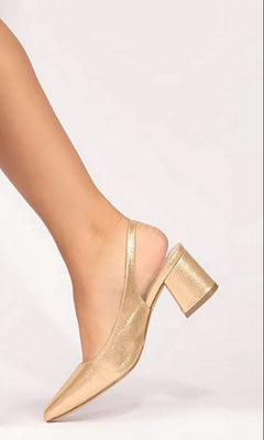 Champagne-colored Imelda Champagne Prom Shoes: Paradox London P2400 slingback block heels worn on a foot.