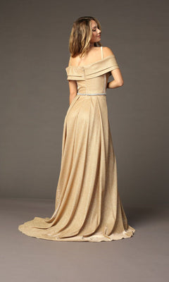 A woman stands with her back to the camera in the Chicas J008 Off-Shoulder Long Glitter Prom Dress, a floor-length gown featuring iridescent sparkle, a fitted waist, and a slight train.