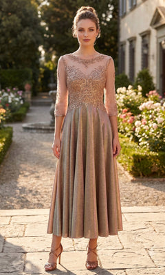 A woman stands outdoors wearing the Midi Wedding Guest Dress: Chicas J040 in shimmering bronze, featuring pink embroidery, sheer sleeves, and a mid-length skirt paired with strappy sandals. A garden and building are visible in the background.