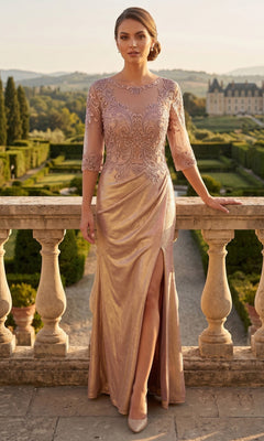 A woman wearing the Long Prom Dress: Chicas J046 in rose gold—with a sheer bodice and delicate embroidered sleeves—stands by a stone balustrade in a formal garden at sunset.