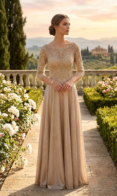 A woman in a sophisticated, champagne-colored “Long Formal Dress: Chicas J052” with a shimmering A-line skirt stands on a stone path in a garden filled with roses, green hedges, and distant villas at sunset.