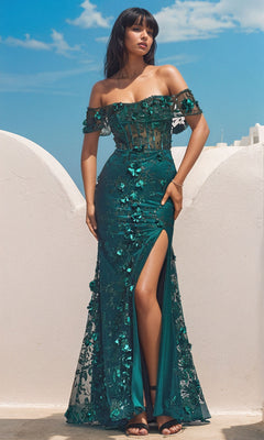 A woman poses outdoors in the Off-the-Shoulder Long Glitter Prom Dress J832, featuring a mermaid silhouette, thigh-high slit, and 3-D floral details against a white architectural backdrop and blue sky.