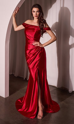 A woman models the Ladivine J877 off-the-shoulder long prom dress in red satin, featuring a mermaid skirt and thigh-high slit, as she stands indoors near a white archway.