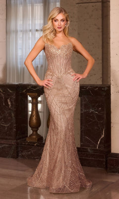 A woman stands indoors wearing the Sheer-Sides Strapless Prom Gown Ladivine J888 in Mocha Gold, a fitted long dress with gold geometric beading and a flared hem.