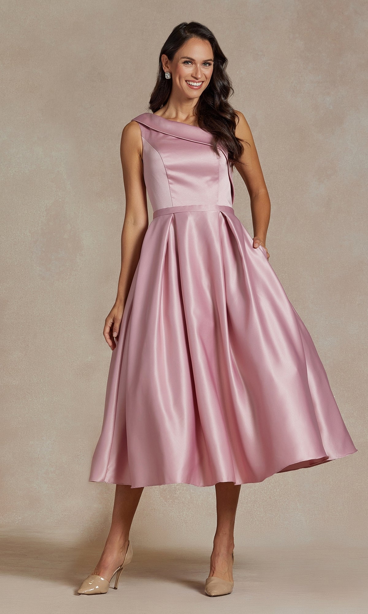 A woman wearing the One-Shoulder Simple Tea-Length Party Dress JE931 in pink.