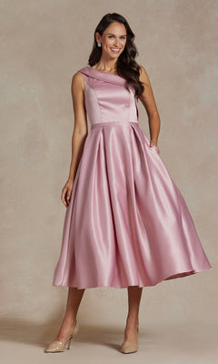 A woman wearing the One-Shoulder Simple Tea-Length Party Dress JE931 in pink.