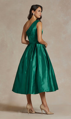 A woman models the One-Shoulder Simple Tea-Length Party Dress JE931 in green, featuring a full skirt and elegant design, as she stands sideways in beige heels against a neutral backdrop.
