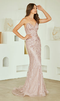 Woman wearing a sparkly pink evening gown in a minimalistic setting