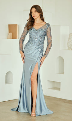 Woman wearing an evening gown with long sleeves in a minimalistic setting.