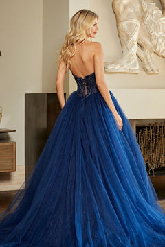 The Amelia Couture JQ1104 strapless prom ball gown in navy blue features a beaded corset bodice and a full glitter tulle skirt.