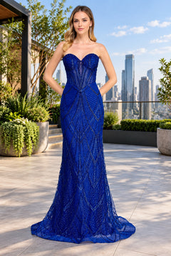 Amelia Couture JQ1107 is a floor-length, strapless blue glitter prom dress featuring an intricate beaded chevron pattern, a sweetheart neckline, and a fitted corset bodice.