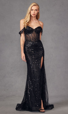 A woman models the Fringed Long Sequin Prom Dress: Juliet JT2471L, featuring off-the-shoulder style, sheer panels, and a thigh-high slit against a plain gray background.
