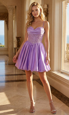 A woman stands indoors on a marble floor with columns in the background, wearing the Short Homecoming Dress: Juliet JT7186A—a light purple dress with a beaded bodice and satin A-line skirt—paired with silver high-heeled sandals.