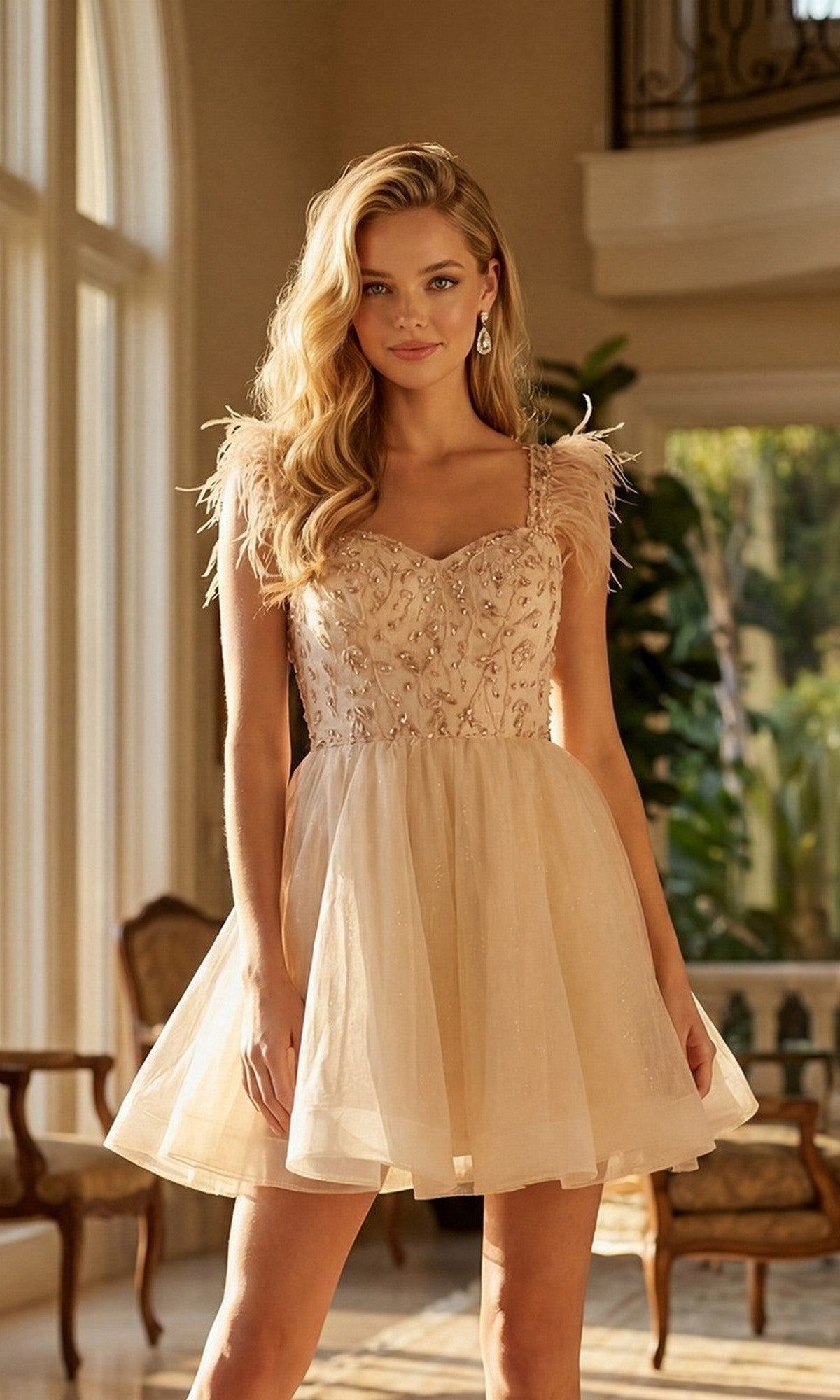 A woman in the Juliet JT881 short homecoming dress in champagne stands indoors near large windows, surrounded by vintage chairs and greenery—a charming choice for your next homecoming.