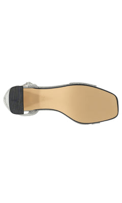 A top-down view of the tan sole and black textured heel on the Lilibet Silver Prom Shoes: Touch Ups 4671, featuring a square toe and low block heel—perfect wide width women’s shoes for prom.