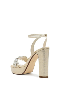 Lily Champagne Platform Prom Shoes: Touch Ups 4709 featuring a gold block heel, ankle strap, and jeweled flower detail on the toe strap.