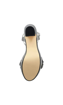 Lily Pewter Platform Prom Shoes: Touch Ups 4710 silver glitter platform sandal with an ankle strap and rhinestone flower detailing, shown from a top-down perspective.