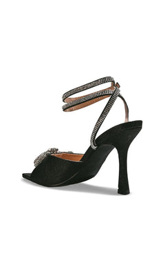 Lux Black Stiletto Prom Shoes: Touch Ups 4741 black stiletto sandals featuring rhinestone-encrusted ankle straps and a decorative ornament on the toe.