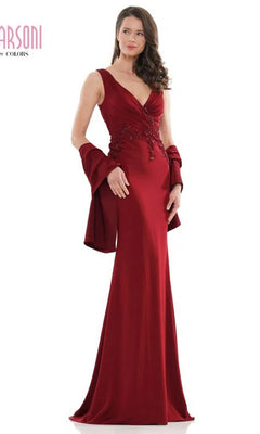 A woman models the Marsoni MV1054 long formal dress in wine, featuring a sleeveless design, embroidered bodice, matching shawl, and floor-length skirt against a plain white background.