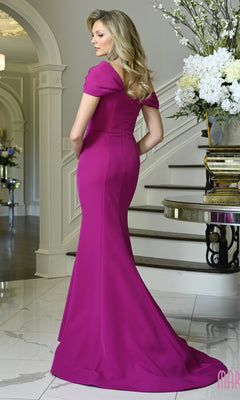 A woman wearing a magenta, off-the-shoulder Marsoni MV1432 crepe evening gown in a floor-length, mermaid silhouette.