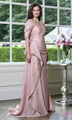 A woman stands wearing a rose-colored, one-shoulder Marsoni MV1437 evening gown with a textured finish and draped waist detail.