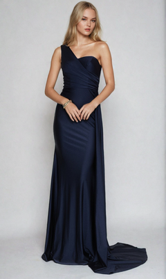 A woman in a floor-length, navy blue Side-Cape One-Shoulder Long Prom Dress 387 stands against a plain light background, channeling an old Hollywood style.