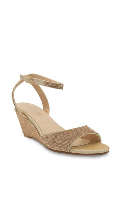 Moxie Champagne Wedge Prom Shoes: Touch Ups 4692 are champagne-colored wedges with rhinestone-embellished straps and an ankle buckle closure.