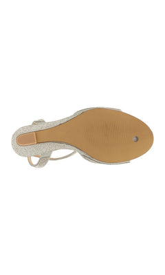 Bottom view of a silver glitter Moxie Silver Wedge Prom Shoes: Touch Ups 4691 sandal featuring a textured brown sole.