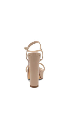 Natalia Nude Platform Prom Shoes: Touch Ups 4705, which are nude patent block heel platform sandals with an ankle strap.